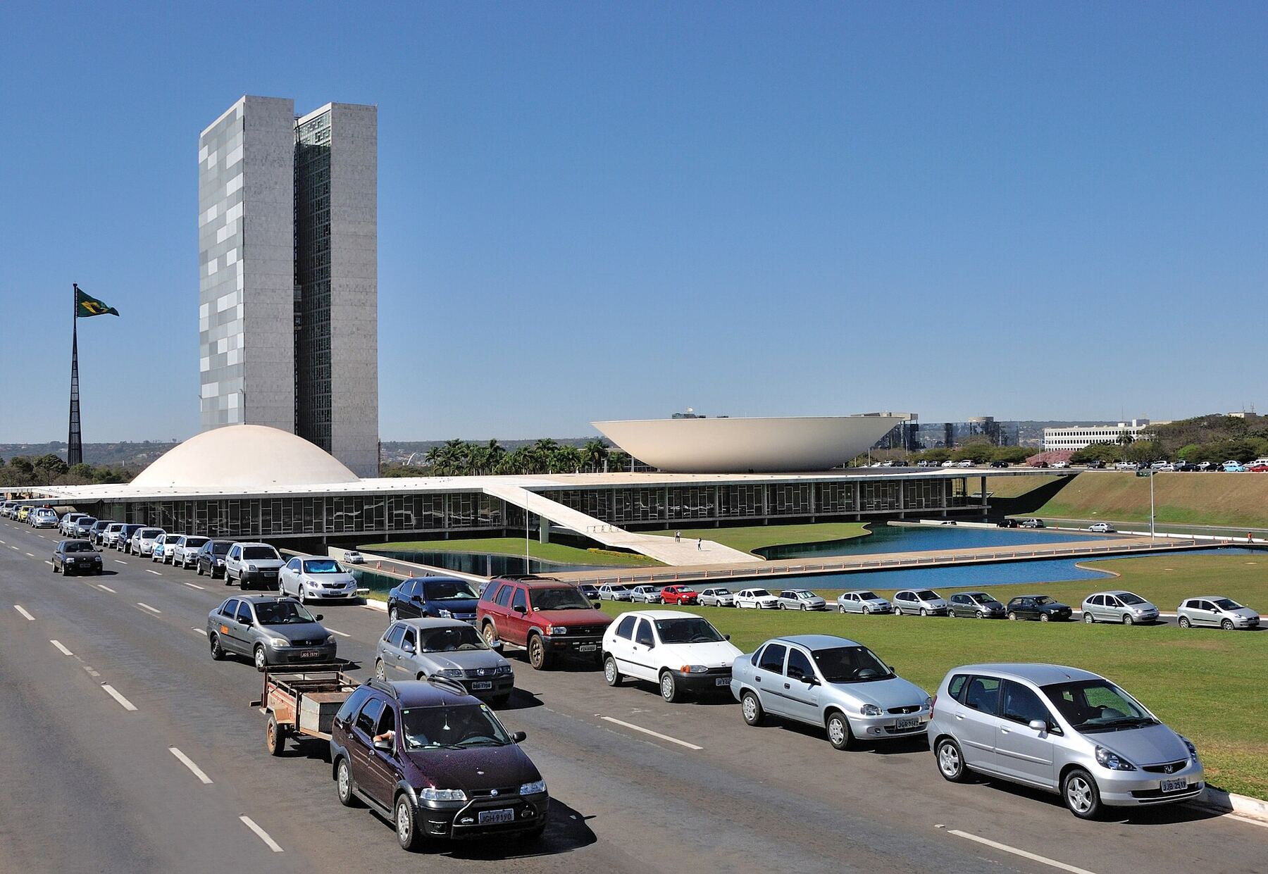 The National Congress buildings in Brasília, Oscar Niemeyer's modernist domes and twin towers under a clear sky